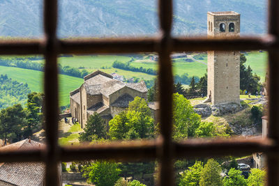 Old building seen through window