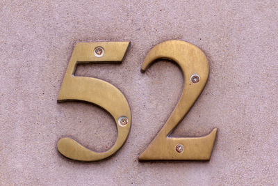 House number 52 in bold metal digits 