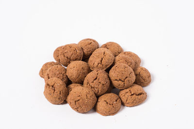 Close-up of cookies against white background