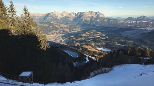 Scenic view of mountains against sky during winter