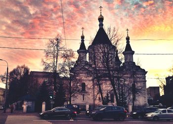 View of city street at sunset