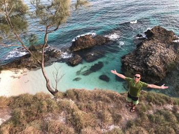 High angle view of man surfing in sea