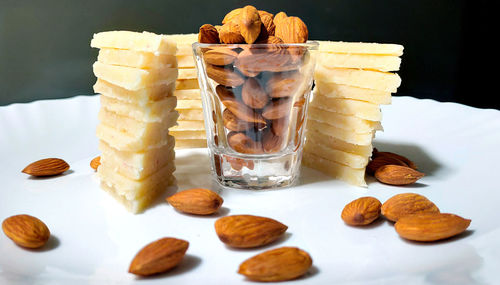 Close-up of cookies in glass on table