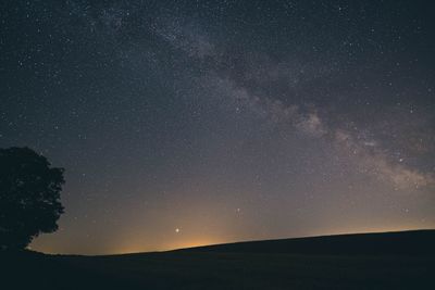 Low angle view of stars in sky at night