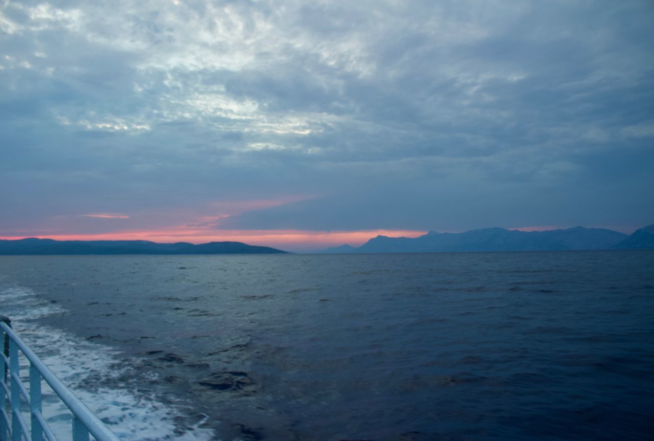 SCENIC VIEW OF SEA AGAINST SUNSET SKY