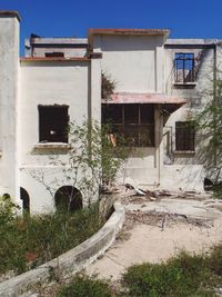 Abandoned house against sky