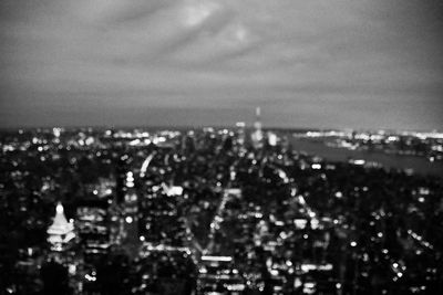 High angle view of city buildings against sky