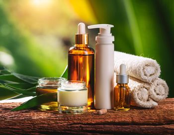 Close-up of beauty products on table