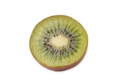 Close-up of lemon against white background