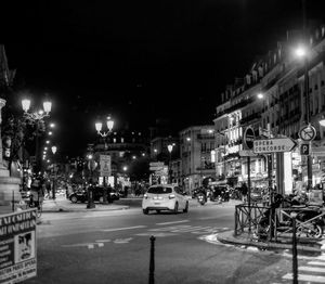 Cars on road at night