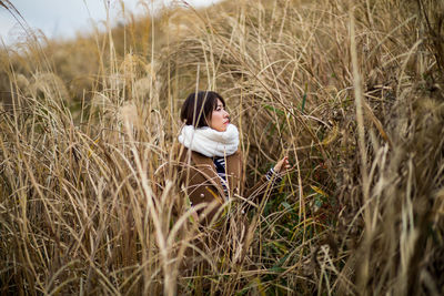 Young woman in grass