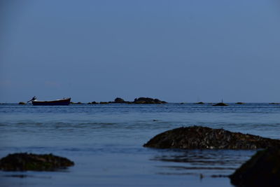 Scenic view of sea against clear sky