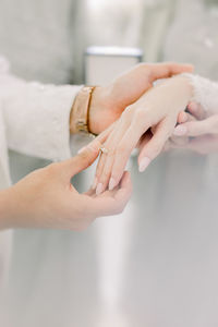 Cropped hand of woman with hands