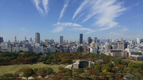 View of buildings in city against sky