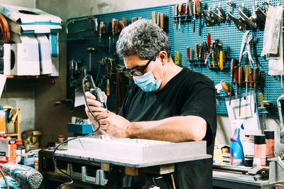 Man working on table