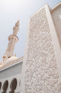 Low angle view of sheikh zayed mosque against sky