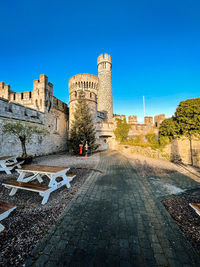 View of historic building against clear blue sky