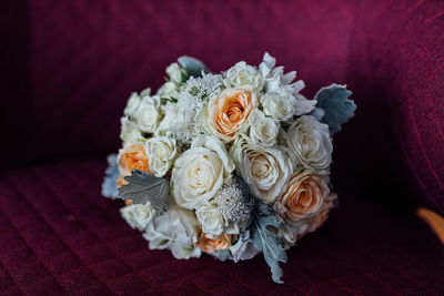 Close-up of wedding rings on jute