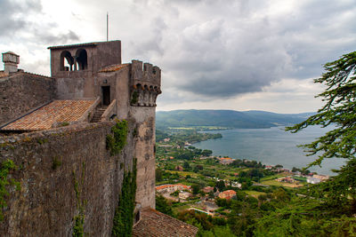 View of lake bracciano from little town bracciano, castello odescalchi on the left