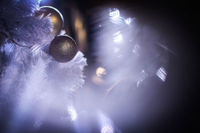 Low angle view of illuminated christmas lights