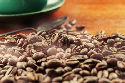 Close-up of coffee beans on table