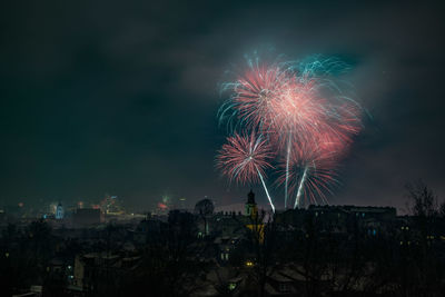 Firework display at night