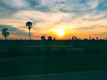 Scenic view of landscape at sunset