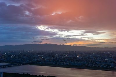 High angle view of buildings against sky during sunset