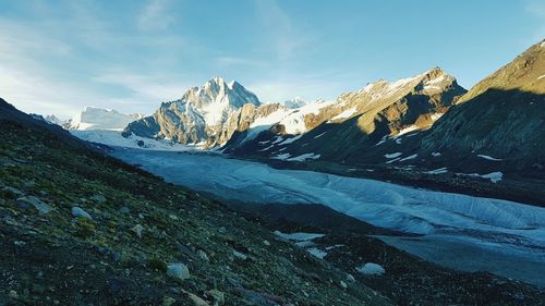 Scenic view of snowcapped mountain against sky