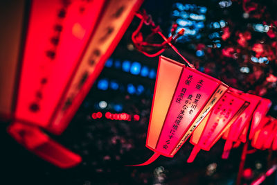 Close-up of illuminated lantern hanging at night