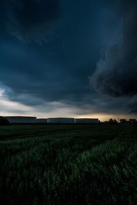 Storm clouds over crossbridge energy fredericia refinery, denmark