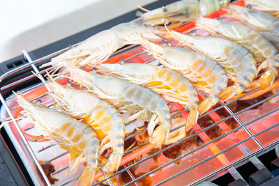 High angle view of shrimp grill on barbecue
