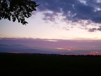 Scenic view of silhouette landscape against sky during sunset