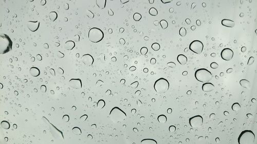 Close-up of water drops on glass