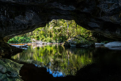 Scenic view of moria gate cave with reflection in the water