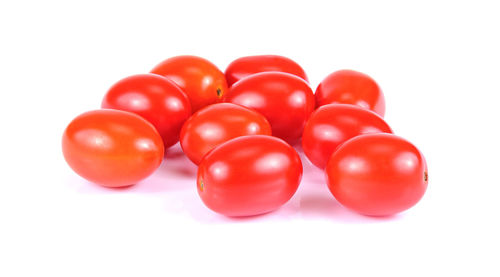 High angle view of tomatoes over white background