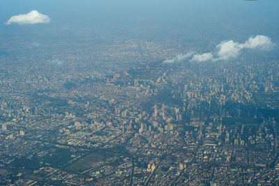 Aerial view of bangkok, thailand from airplane. crowd of commercial district.