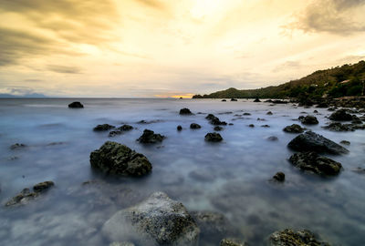 Scenic view of sea against sky during sunset