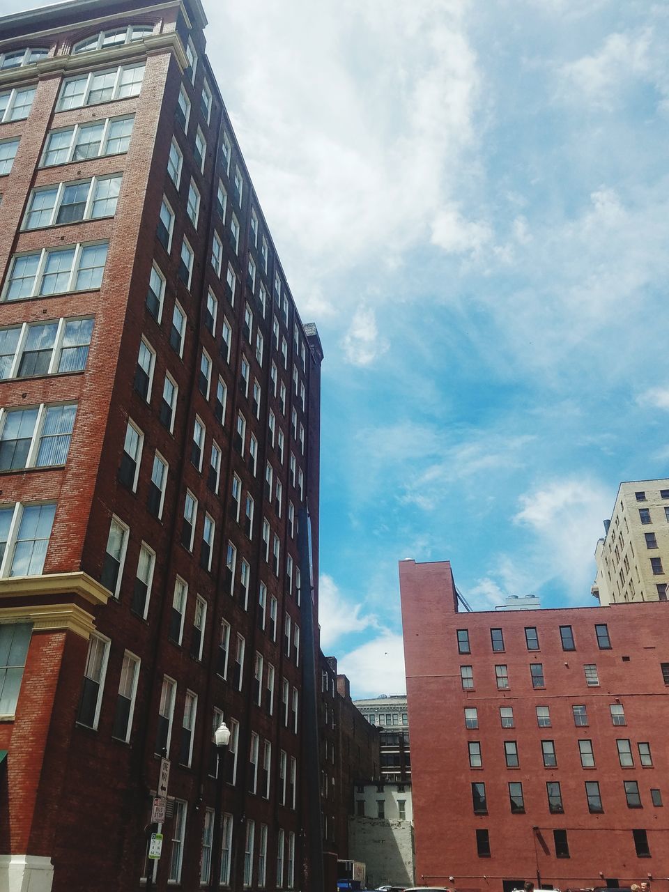 LOW ANGLE VIEW OF BUILDINGS IN CITY