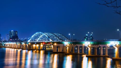 Reflection of the illuminated yanghwa bridge on the han river