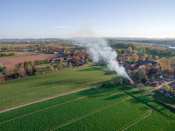 Aerial view of agricultural field against sky