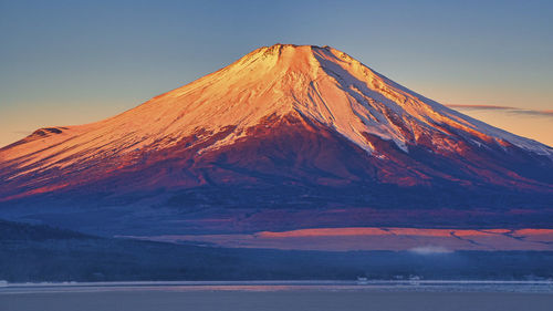A world heritage site mt.fuji reflection in lake yamanaka