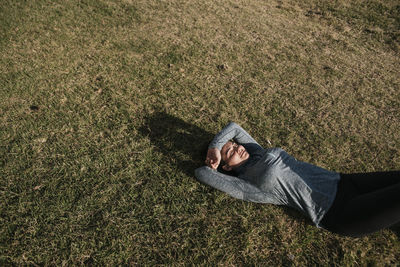 Young woman relaxing on the grass