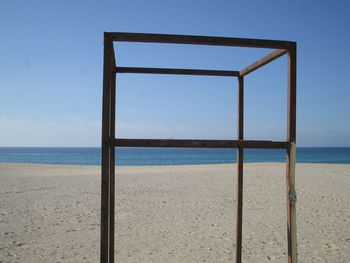 Scenic view of calm sea against clear sky