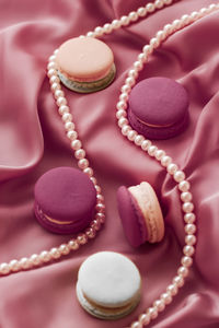 Close-up of wedding rings on table