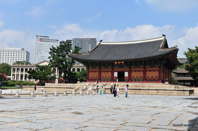 Group of people in front of building