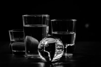 Close-up of glasses on table