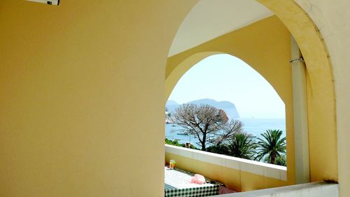 View of sea seen through window