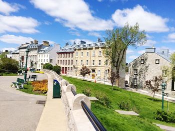 Buildings in city against sky