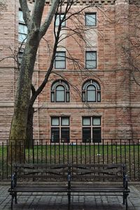 Woman standing in front of building